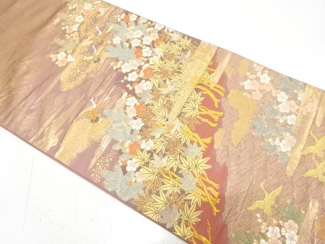 Bag belt with woven pattern of cranes, young pine trees, branches of plum trees,